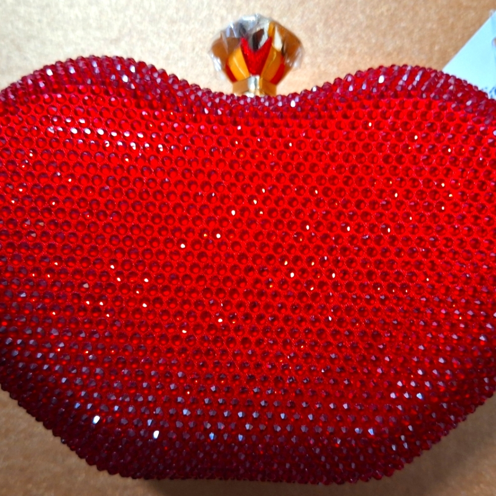 Red lip shape clutch. Red Rinestones. Chain strap.